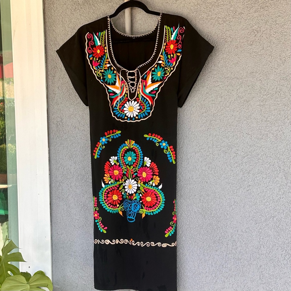 Traditional Mexican style dress, handmade with embroidery detail.